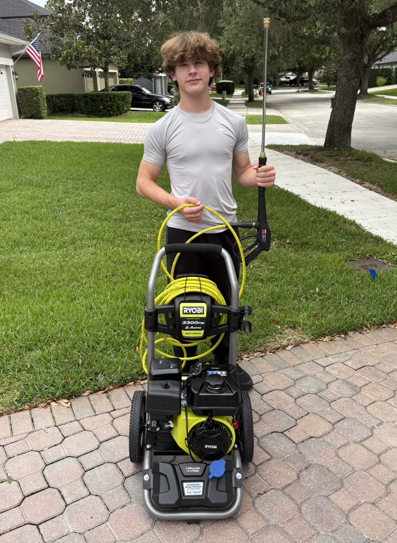 Asher with power washing equipment